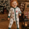 Toddler in Zip Romper Country Christmas Bows pajamas holiday lifestyle photo