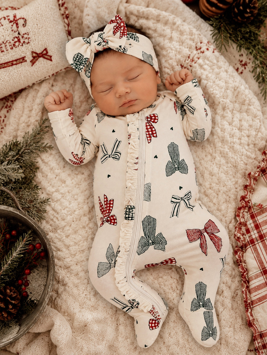 Sleeping baby in Ruffle Footie Country Christmas Bows pajamas