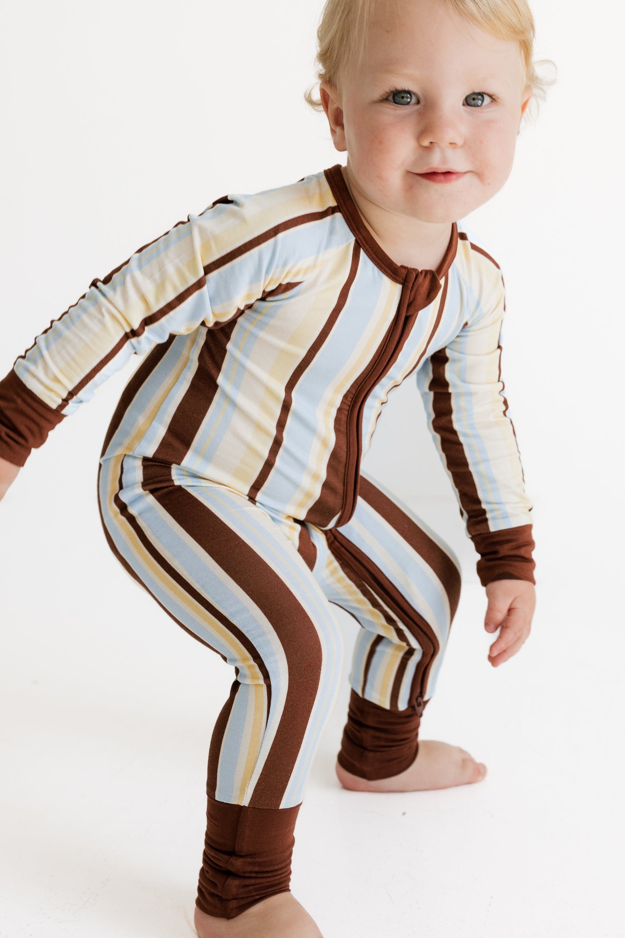 Leo Stripe Zipper Romper flat lay