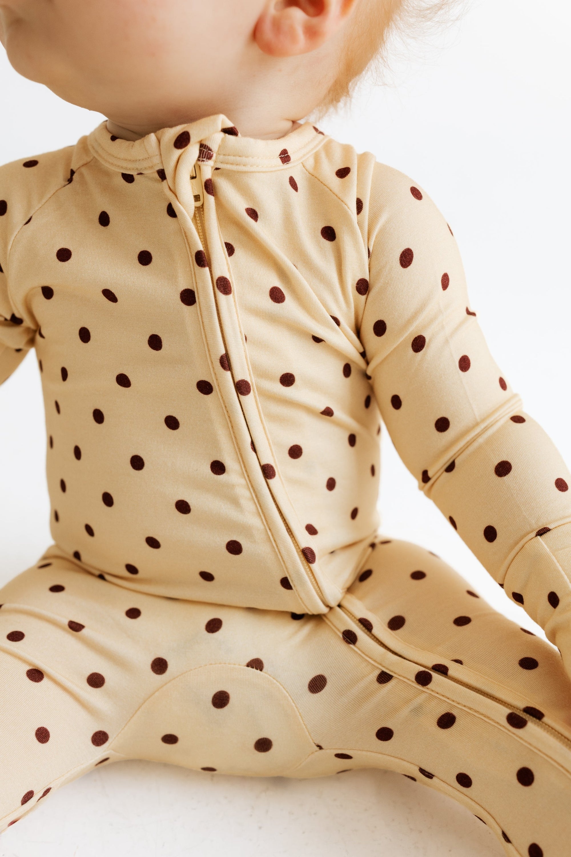 Yellow and Brown Polka Dot Zipper Romper detail view