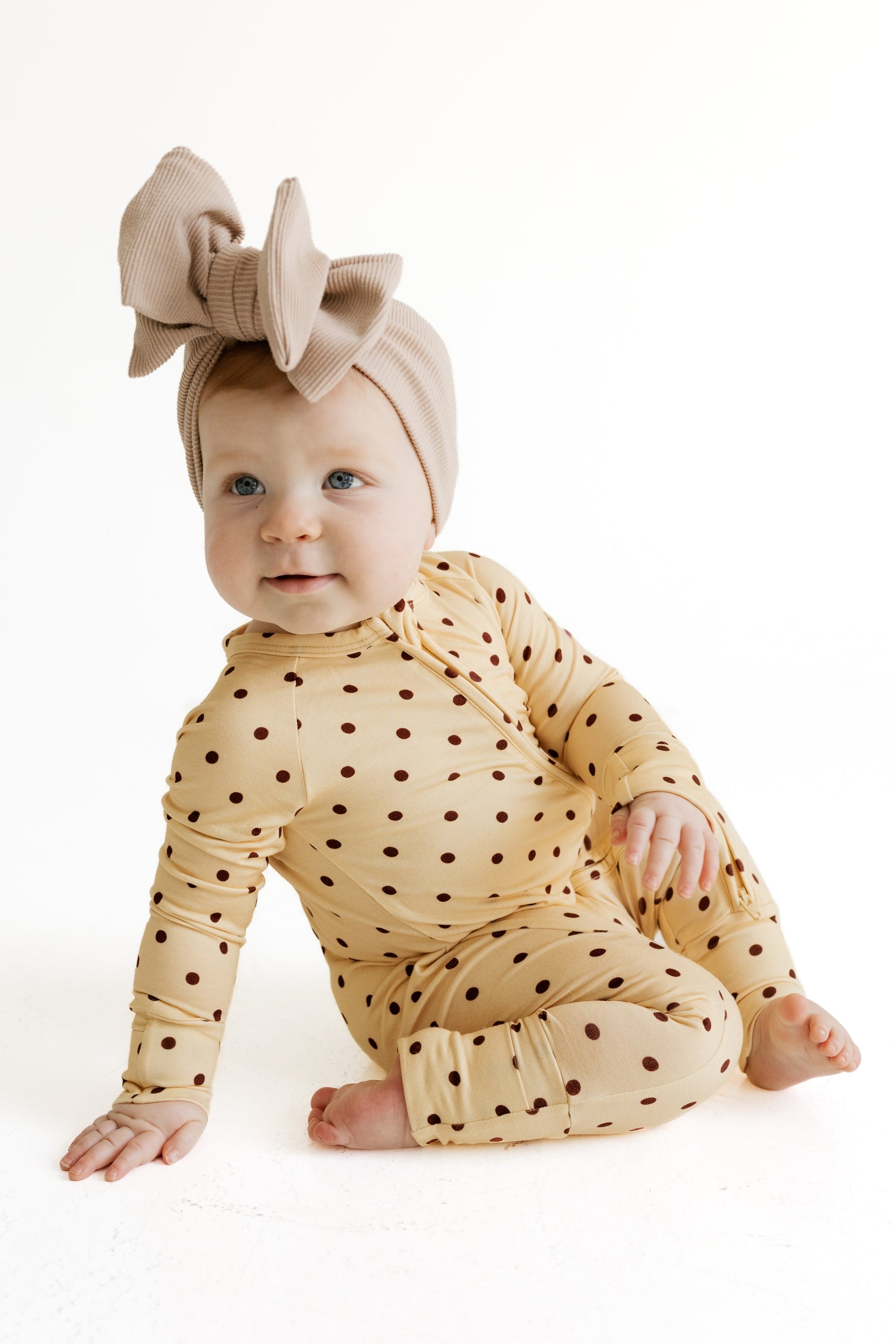 Yellow and Brown Polka Dot Zipper Romper baby lifestyle photo