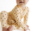 Yellow and Brown Polka Dot Zipper Romper flat lay