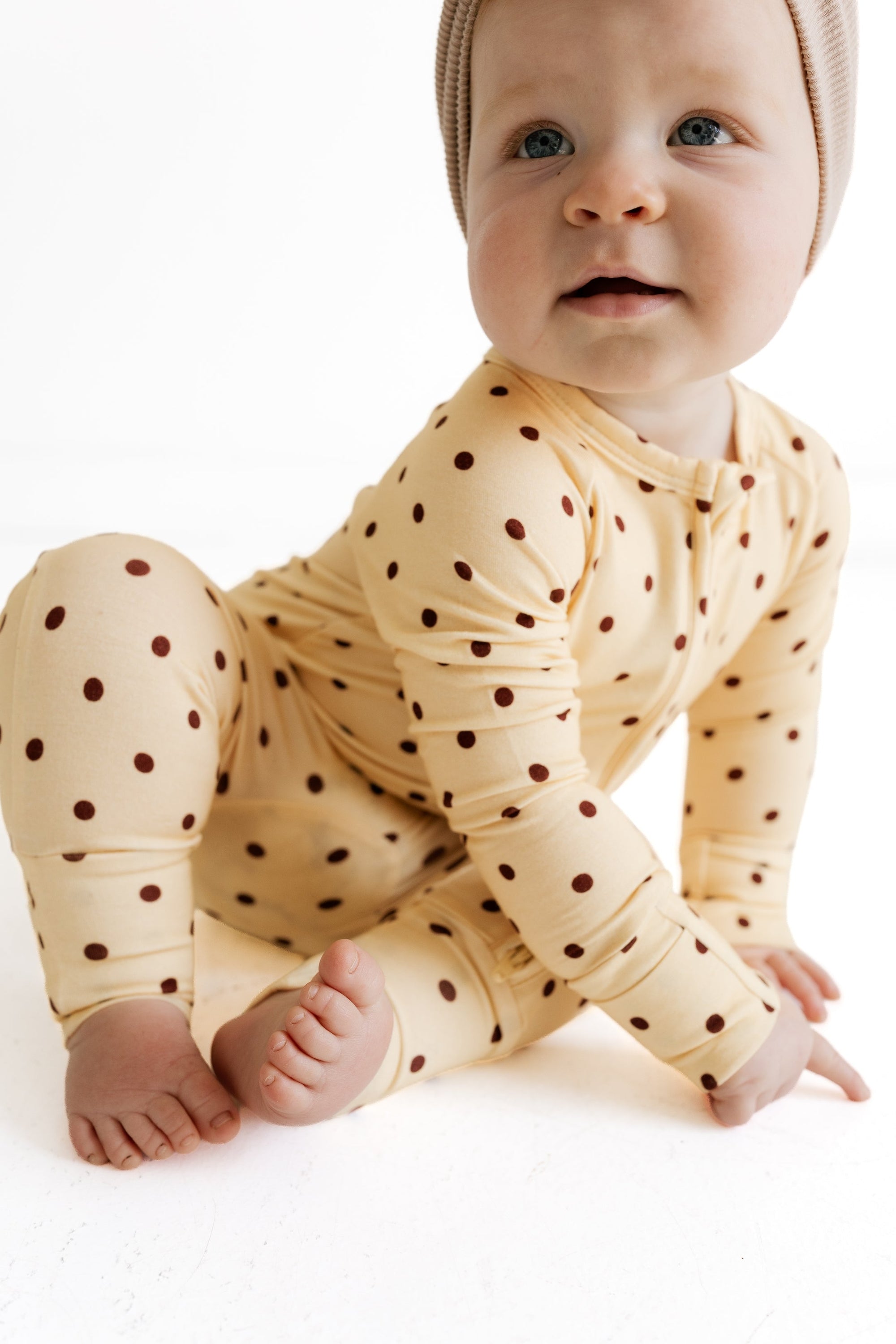 Yellow and Brown Polka Dot Zipper Romper flat lay