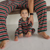 Matching Holiday Stripe pajamas for dad and baby