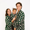 Family in matching Christmas Goose pajamas