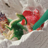 Brushing away plaster to find a dinosaur