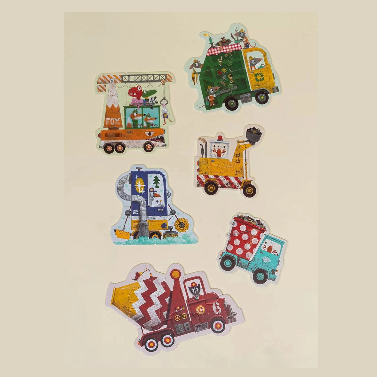 Six completed construction vehicle puzzles