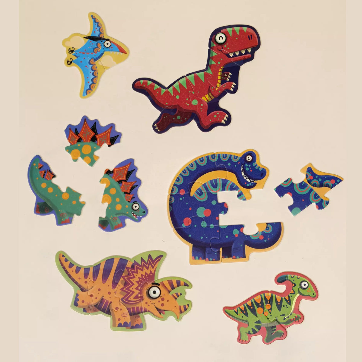Dinosaur puzzle pieces separated