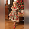 Mini Aster Dress in Red Roses - worn by the Christmas tree