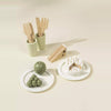 Wooden picnic dishes and fruit