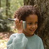 Child talking on walkie talkie